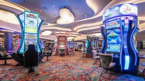 Tampilan grid permainan Mahjong Ways 2 di 77raja.com menunjukkan simbol mahjong dan fitur cascading reels
